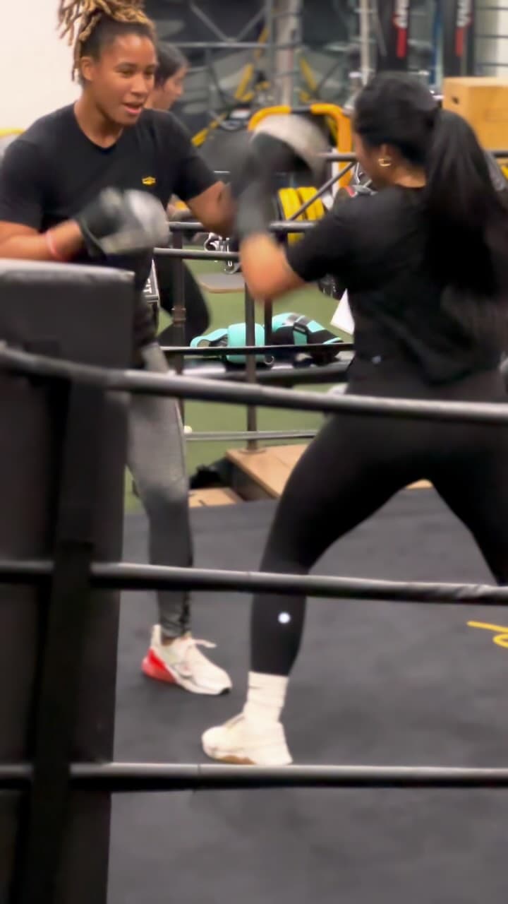 Members sparring and pad work at BoxFit